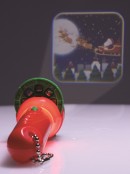 Christmas Torch Projector With 24 Christmas Themed Images On Slot Reels