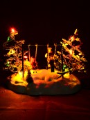 Kids On The Playground Swing Animated LED Christmas Village Scene - 14cm