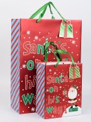 Large Red Christmas Gift Bag With Santa's On His Way! Print
