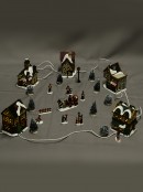 Christmas LED Battery Village Scene With Townsfolk Figurines - 24 Piece Set