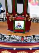 Rotating Musical Christmas Chair-O-Planes Carousel LED Village Scene - 34cm