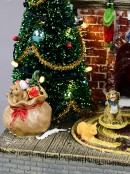 Animated Santa, Toys & Fireplace LED Battery Christmas Village Scene - 20cm