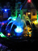 Illuminated & Animated Town Scene With Water Fountain Ornament - 27cm