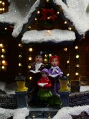 Snow Capped Church Village Scene With Moving Children & Led Lights - 25cm
