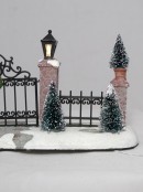 Iron Gate Stone Pillars With Lit Lanterns Figurine - 24cm