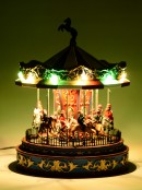 Rotating Musical Christmas Carousel With Multi Colour LED Illumination - 25cm