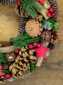 Natural Wreath With Pine Cones, Stars, Wood Chunks, Berries & Bells - 35cm