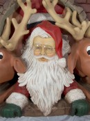 Resin Santa & Reindeer Squeezing Out Of Fireplace Decor - 1.1m