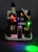 Illuminated Christmas Village Scene With Village Shops & Figurines - 11 Piece