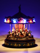 Rotating Musical Christmas Carousel With Multi Colour LED Illumination - 25cm