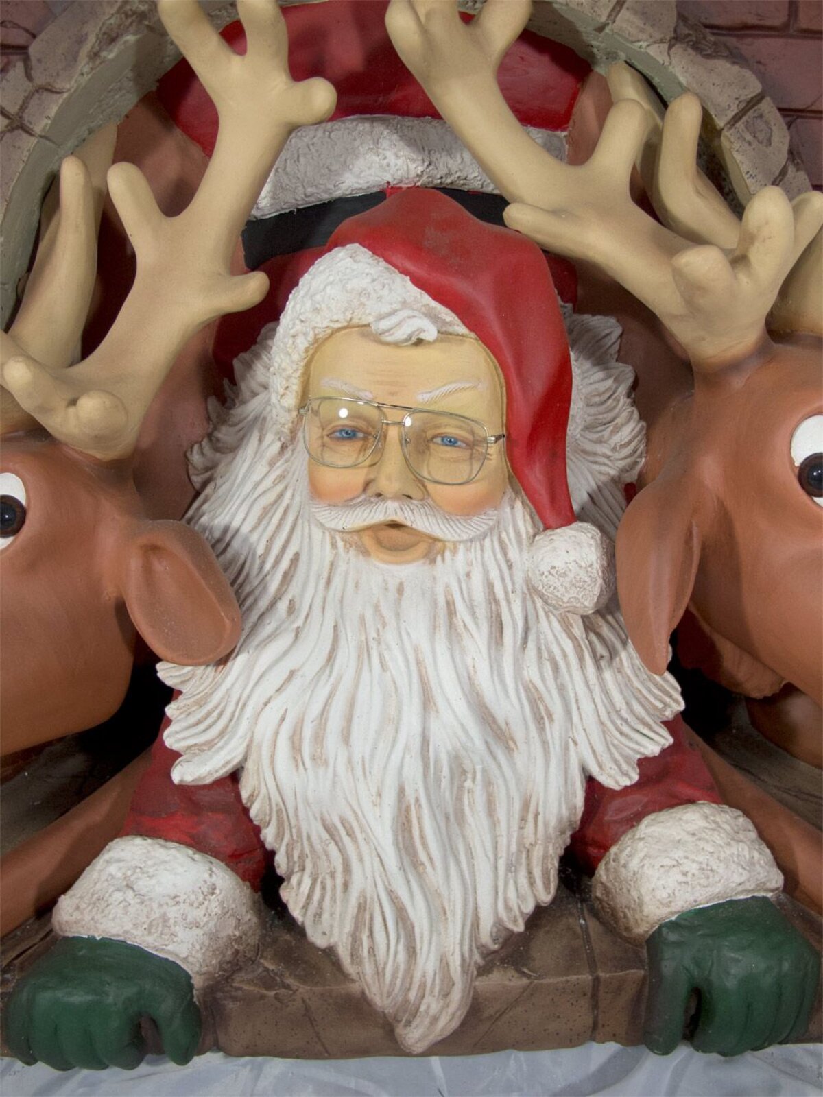 Resin Santa & Reindeer Squeezing Out Of Fireplace Decor - 1.1m — image 2
